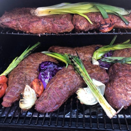 Barbecued meat and vegetables on the grill